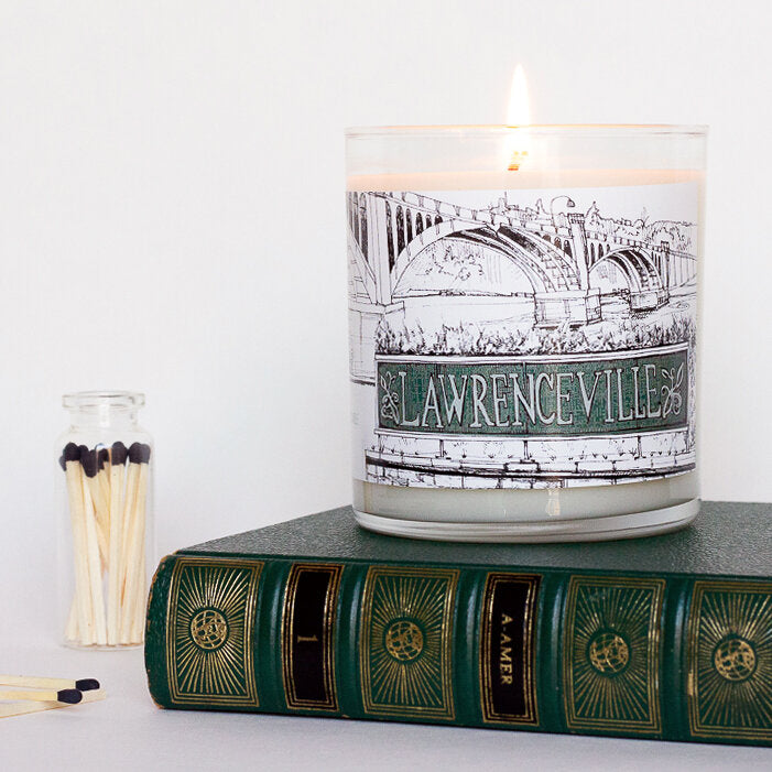 8.5 oz soy candle with black white and green Lawrenceville and 40th Street Bridge drawing